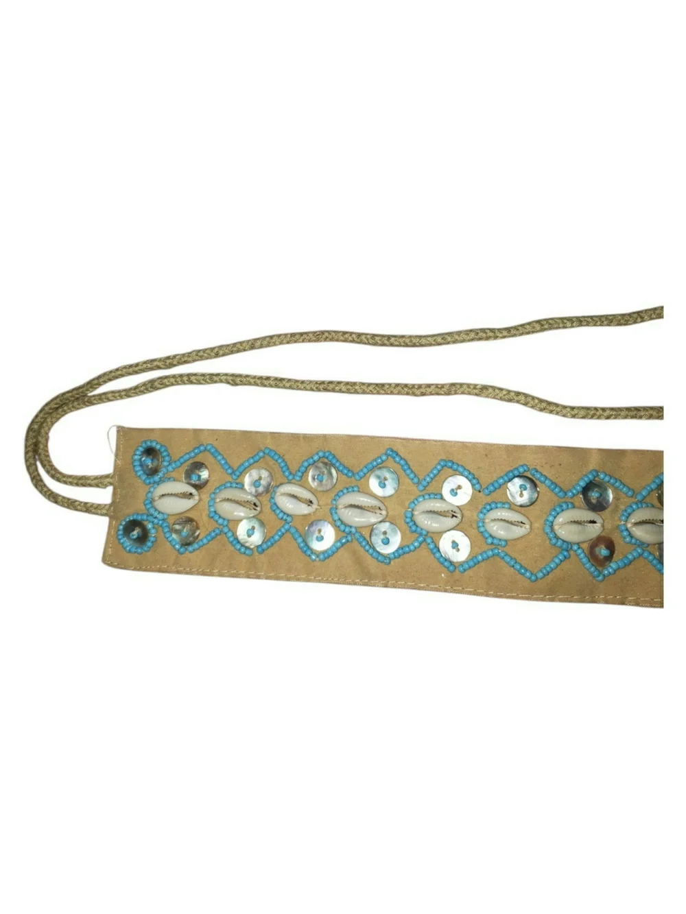 Womens vintage bohemian-style tie belt adorned with natural cowrie shells.
